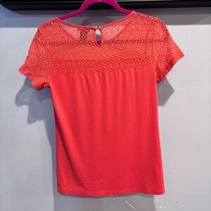 Ann Taylor , XS,‎ organge top with crochet/lace at the top. Key hole back.